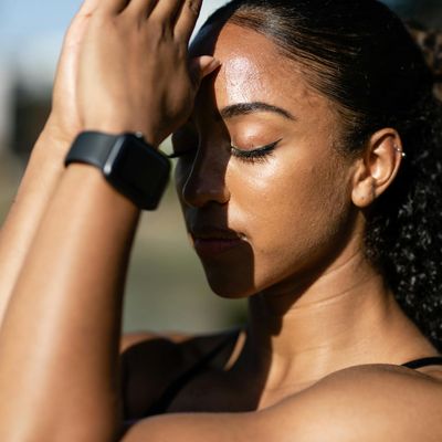 Close-up of a person in a meditative state, calm expression.